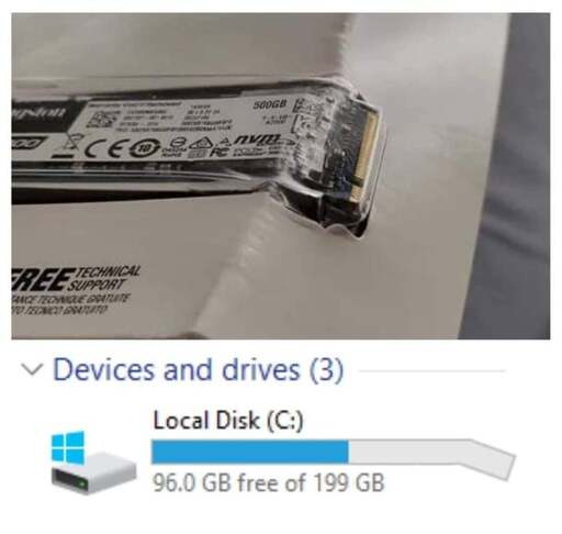 a picture of an nvme drive. the end with the connector is bent downwards (it should not be bent like that). the windows file explorer bar representing the drives storage usage is  edited to be bent like the drive .